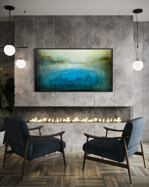 Ancient Water Horizon canvas print with blue, teal, and green tones hangs on a textured concrete wall above a long linear modern fireplace. 