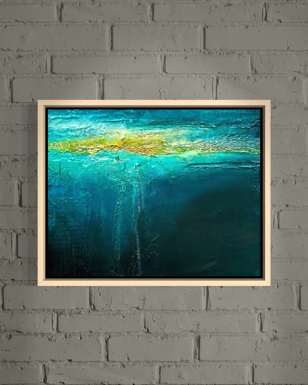 Beneath mixed media ocean abstract painting in maple frame by artist Jen Muse