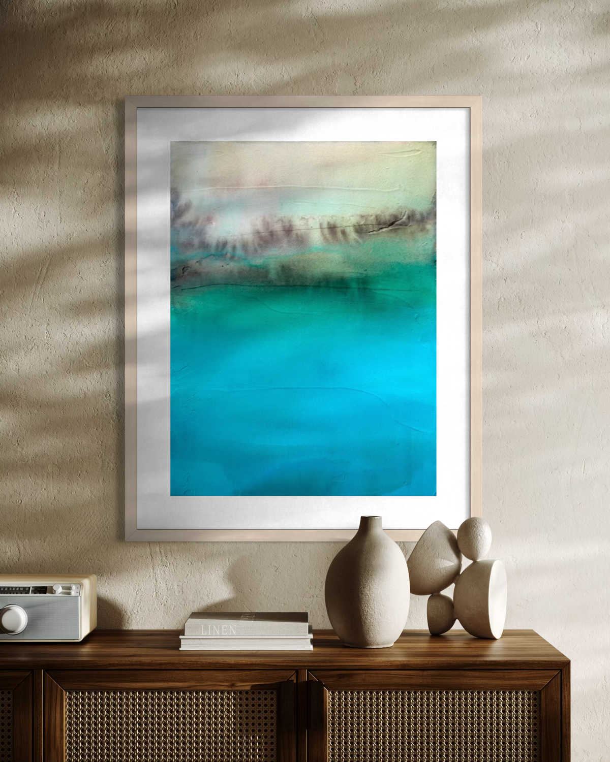 Hidden Waters #1 fine art print framed in natural wood shown in a bright sunlit modern dining room