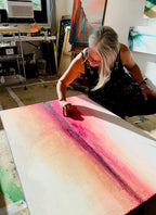 Artist Jen Muse working on Le Soleil Levant abstract painting in her studio