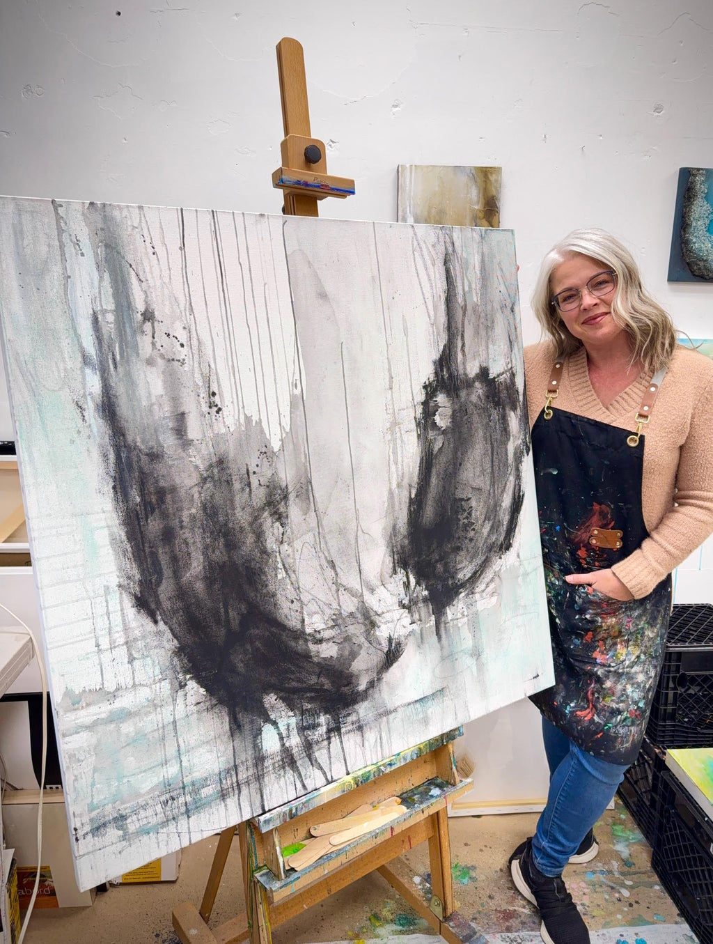 Soaring charcoal abstract painting with jen muse in the studio