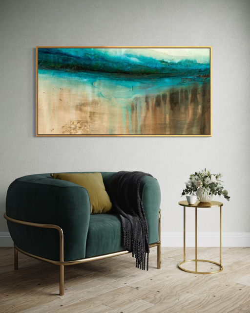 The Flow of Time Horizon is modern abstract of water and stone, inspired by the Cenotes of Mexico shown witha modern, cozy, sofa by artist Jen Muse.