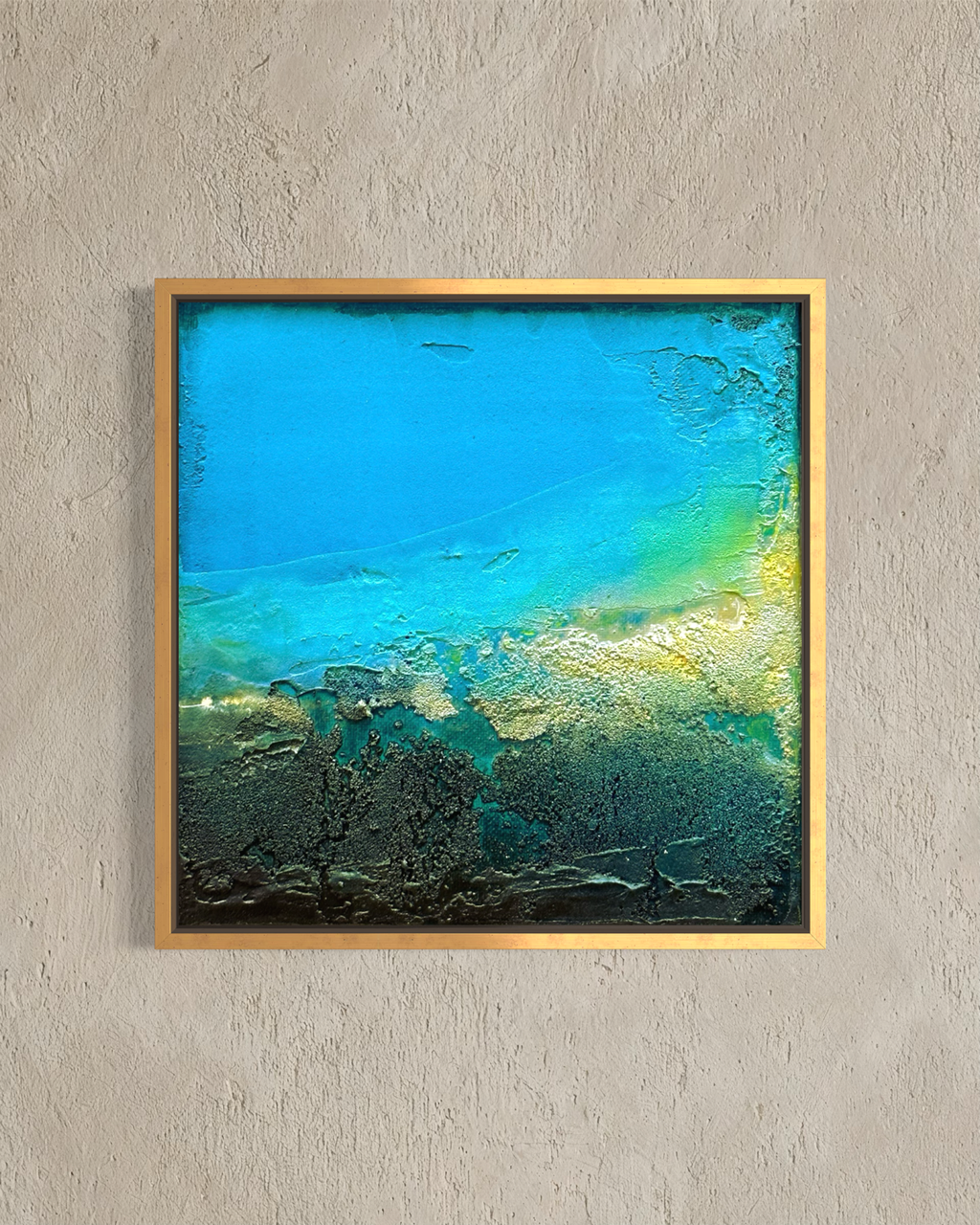 Modern abstract ocean shore canvas print in a gold frame by artist Jen Muse