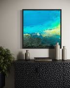 Modern abstract ocean shore canvas print in a modern dining room by artist Jen Muse