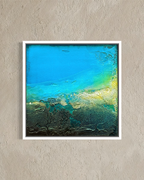 Modern abstract ocean shore canvas print in a white frame by artist Jen Muse
