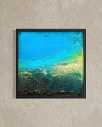 Modern abstract ocean shore canvas print in a black frame by artist Jen Muse