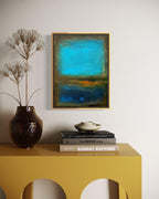 Precious Moment abstract canvas print in a gold frame in modern office