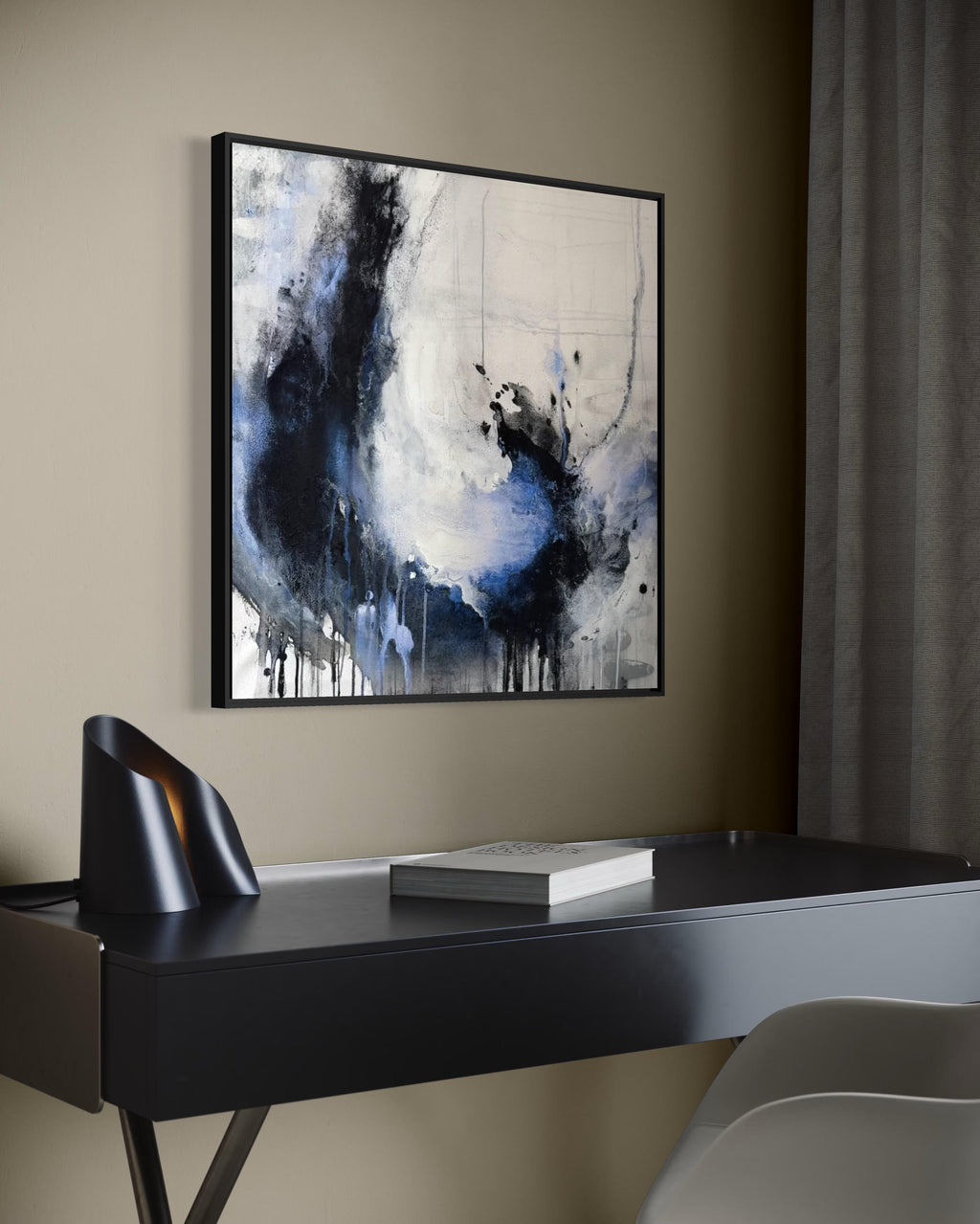 Enduring charcoal abstract painting in black floating frame over modern desk in office
