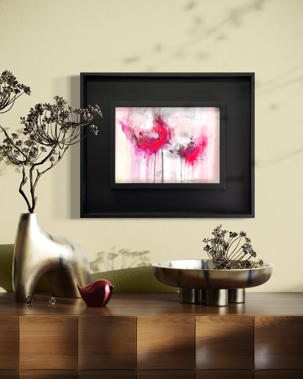 Abstract pink floral painting with modern black frame in dining room