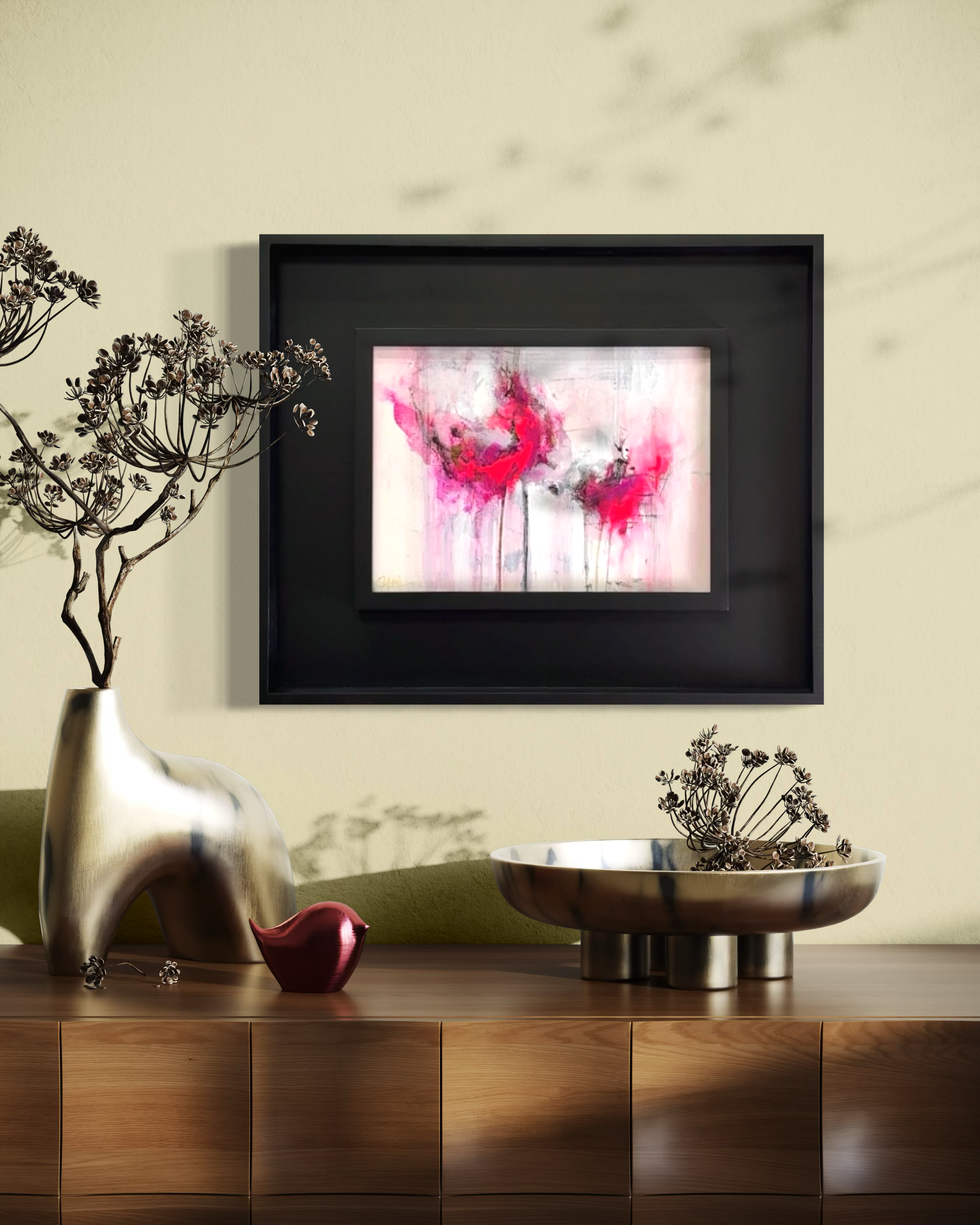 Abstract pink floral painting with modern black frame in dining room