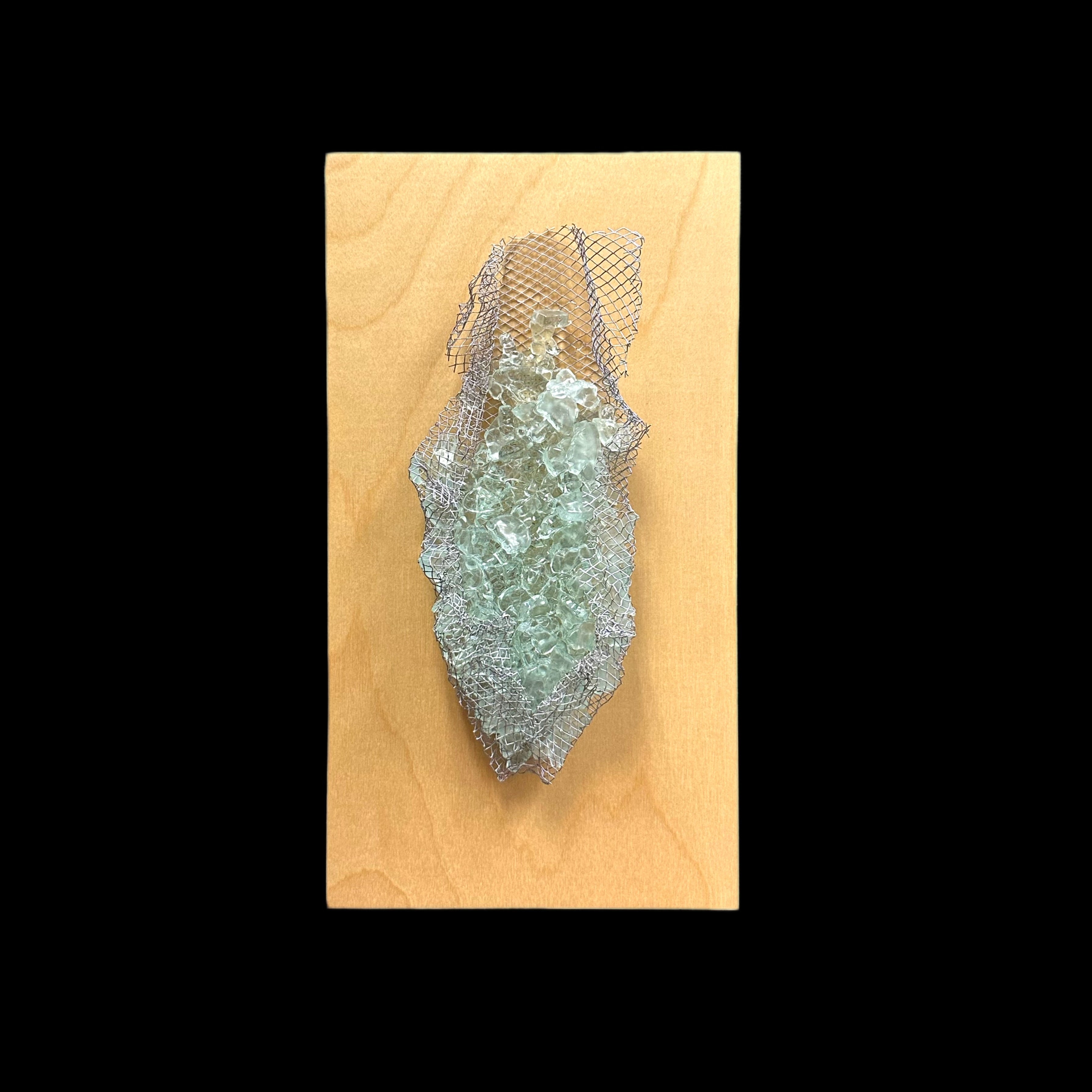 Kiln-formed recycled glass wall sculpture on maple wood 1
